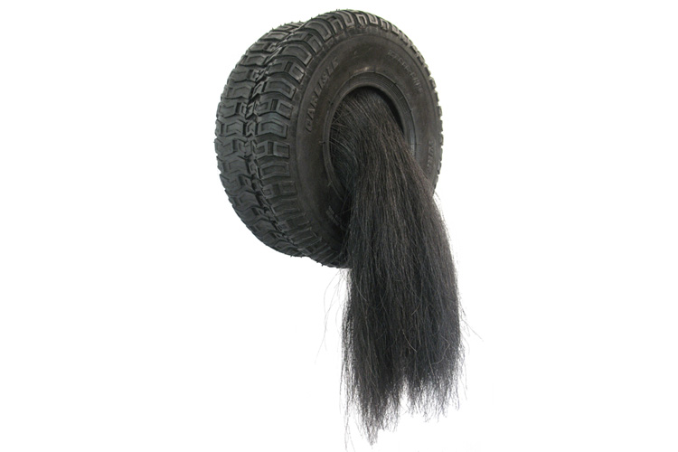 <b>Untitled (Small Tire), 2009</b><br>24"H x 12.5"W x 10"D<br<rubber tire, horse hair, fabric